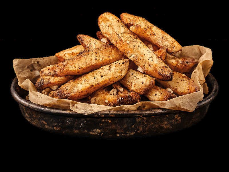Porción de papas fritas condimentadas